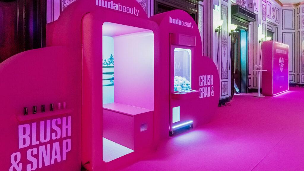 Huda Beauty activation that is photobooth and claw machine binded together